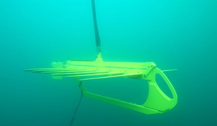The Wave Glider consists of a floating surfboard-type platform